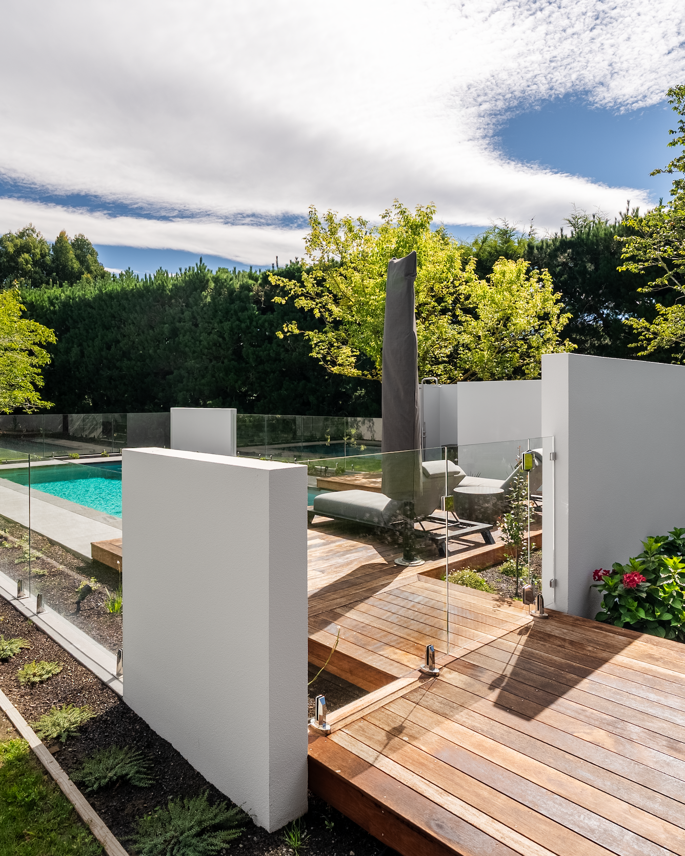 Careful spatial planning ensures that no single element dominates the experience. The pool has glass balustrading.