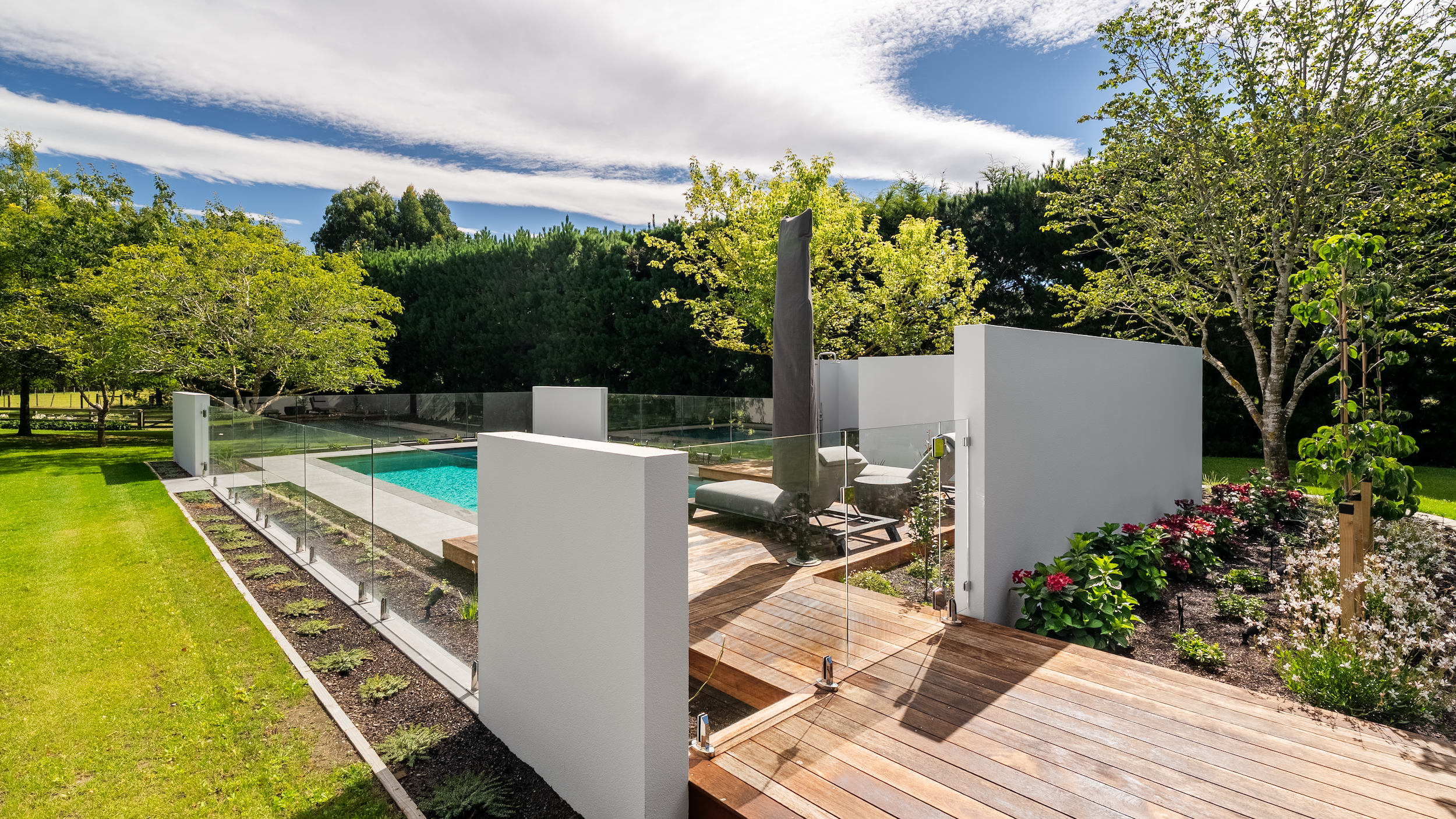 Careful spatial planning ensures that no single element dominates the experience. The pool has glass balustrading.