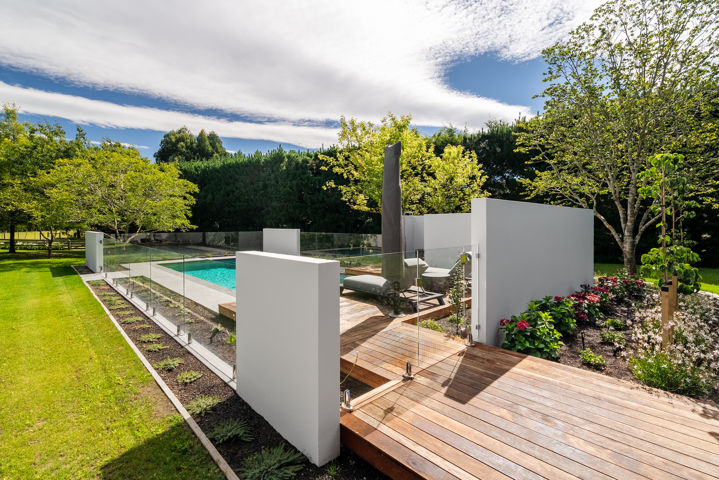 Careful spatial planning ensures that no single element dominates the experience. The pool has glass balustrading.